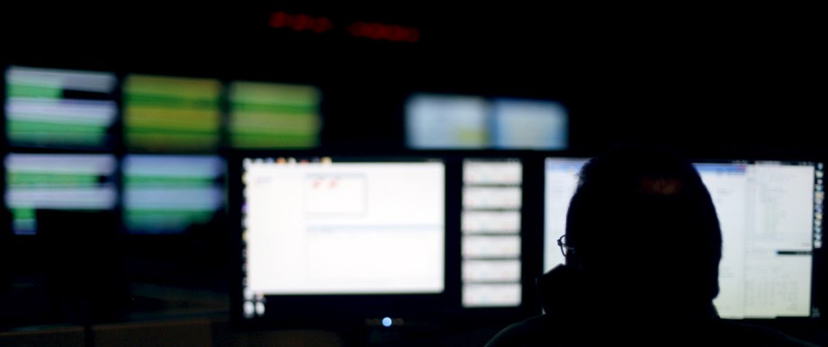 File photo of a cybersecurity expert monitoring telecommunications traffic at a network operations center in a Verizon facility in Ashburn