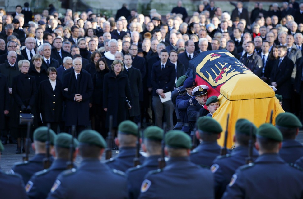 German army Bundeswehr soldiers carry the coffin holding the body of late former West German Chancellor Schmidt after the memorial service in St. Michael's Church (Sankt Michaelis) in Hamburg