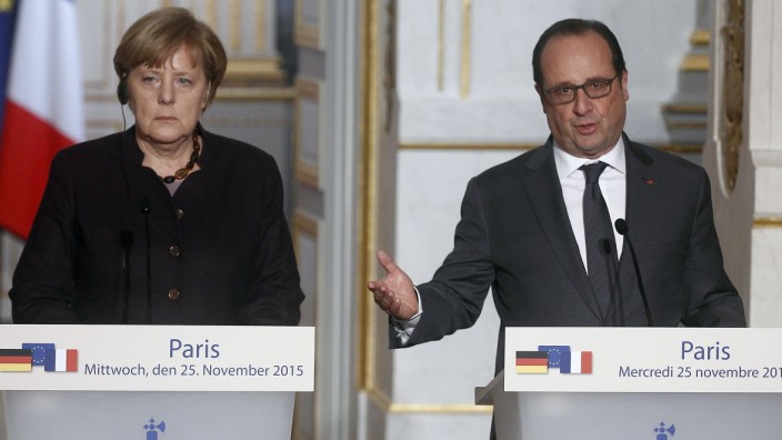 French President Francois Hollande Receives  German Federal Chancellor Angela Merkel At Elysee Palace