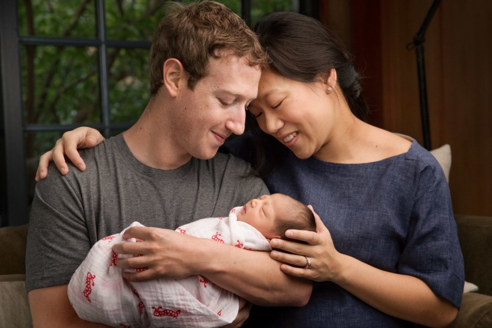 New dad Zuckerberg vows to give away Facebook fortune