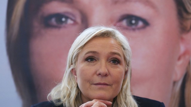 Marine Le Pen, French National Front political party leader and candidate for the regional elections in the Nord-Pas-de-Calais-Picardie region, attends a news conference in Lille