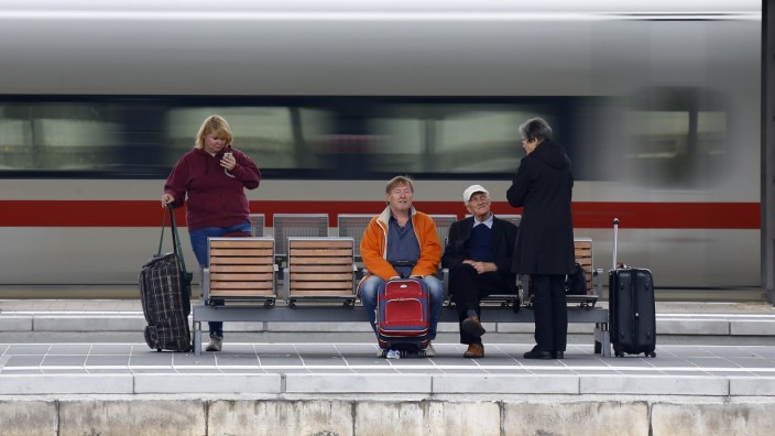 Passengers of German railway Deutsche Bahn are seen at Frankfurt's main railway station