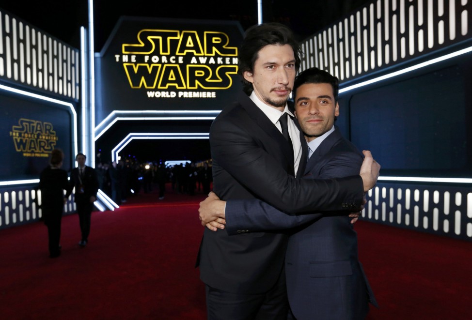 Actors Driver and Isaac embrace as they arrive at the premiere of 'Star Wars: The Force Awakens' in Hollywood
