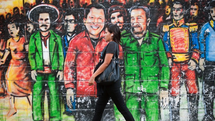 Lateinamerika: Ein Graffito mit Hugo Chavez und Fidel Castro in Venezuelas Hauptstadt Caracas.