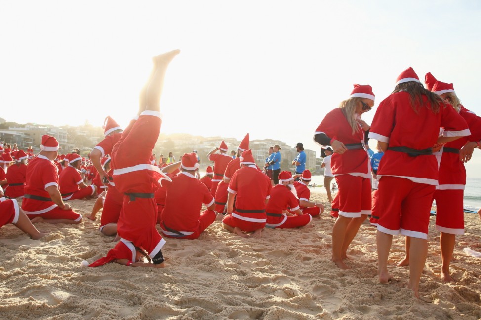 Hundreds Of Surfing Santas Attempt Guinness World Record For Largest Surfing Lesson