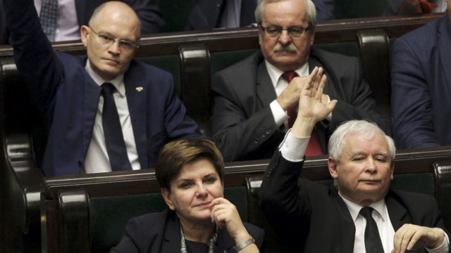 Polish Prime Minister Szydlo and Kaczynski, leader of ruling Law and Justice party attend the session of Polish parliament during a debate on a new law regarding the Polish Constitutional Tribunal, in Warsaw