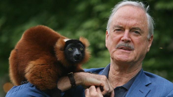 John Cleese Meets Colin The Lemur At Bristol Zoo