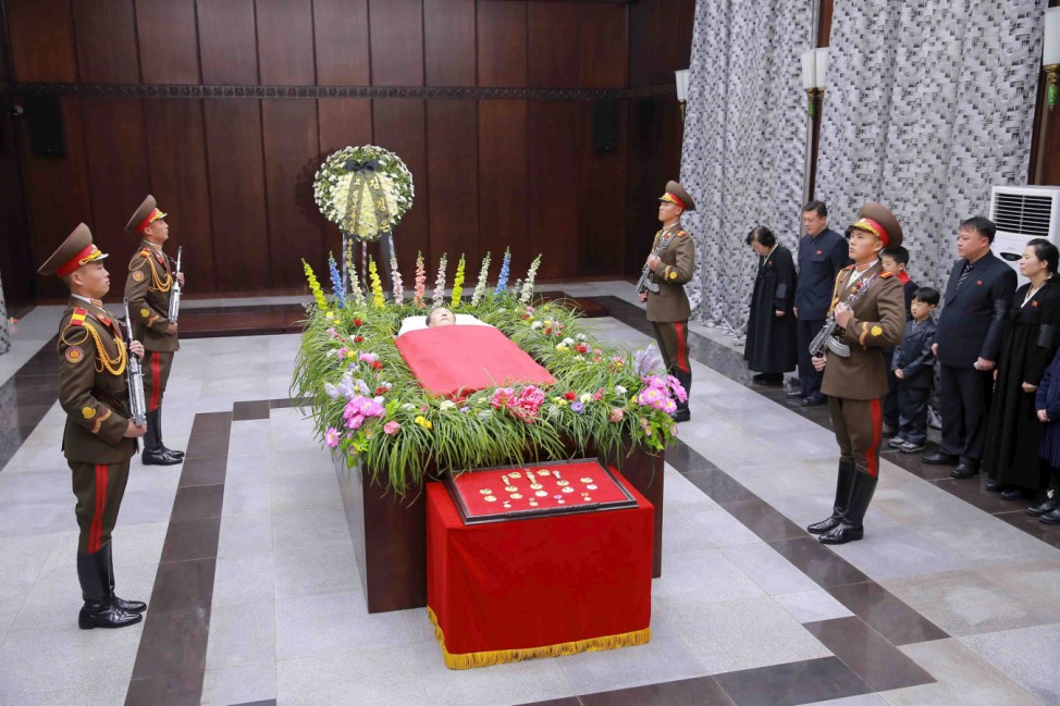 Honor guards stand by the coffin of Kim Yang Gon in this undated photo released by North Korea's Korean Central News Agency (KCNA) in Pyongyang