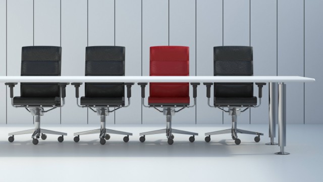 Four office chairs and conference table in front of grey wall panel 3D Rendering PUBLICATIONxINxGER