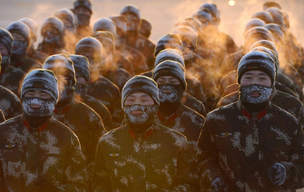 Paramilitary policemen take part in a winter training in Shenyang