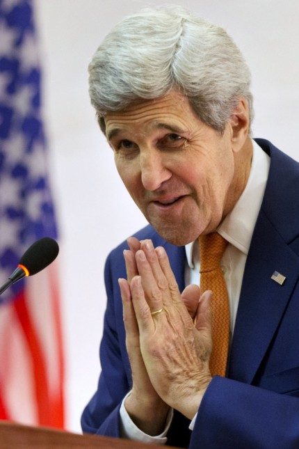 U.S. Secretary of State John Kerry greets U.S. Embassy staff in Vientiane
