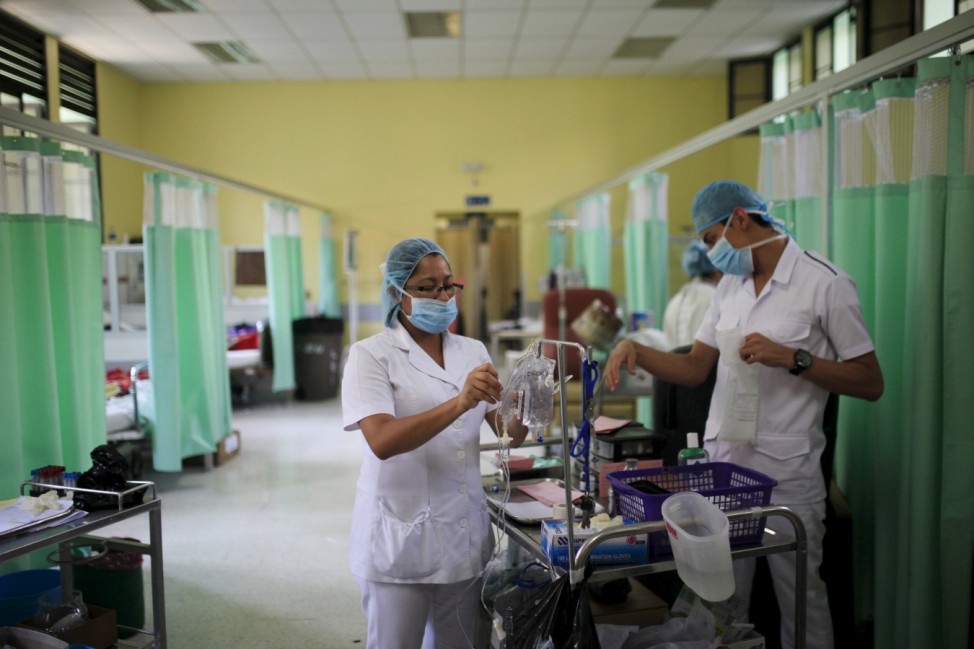 Nurses take care of Guillain-Barre syndrome patients in the neurology ward at the Rosales National Hospital in San Salvador