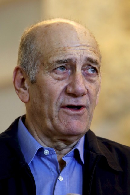 File picture shows former Israeli Prime Minister Olmert speaking to the media after a hearing at the Supreme Court in Jerusalem