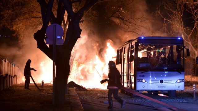 Firefighters prepare to extinguish fire after an explosion in Ankara