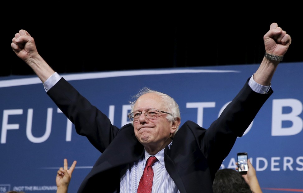 U.S. Democratic presidential candidate Bernie Sanders celebrates on stage at a campaign rally in Henderson