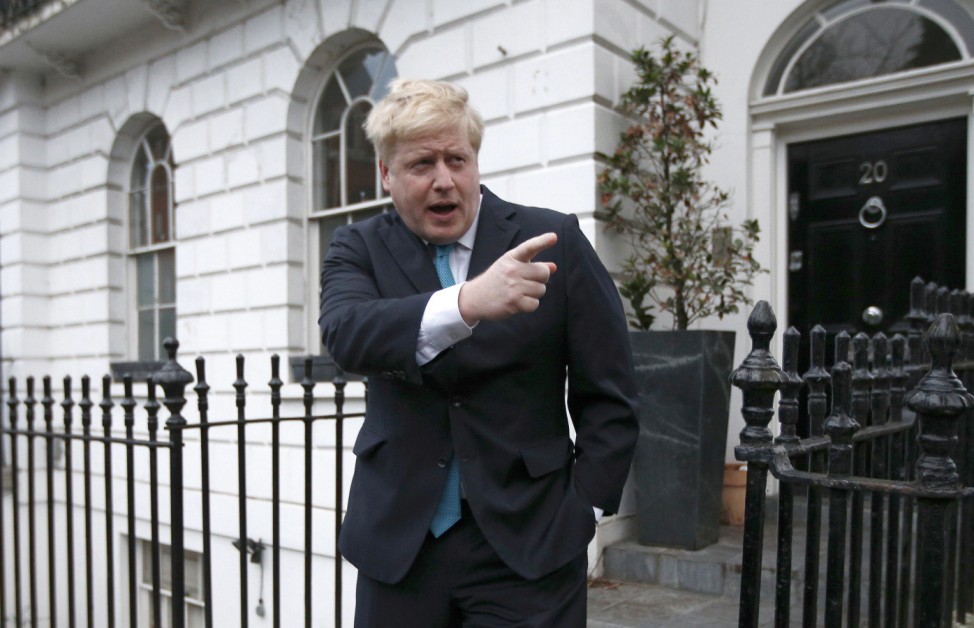 London Mayor Boris Johnson prepares to speak to the media in front of his home in London