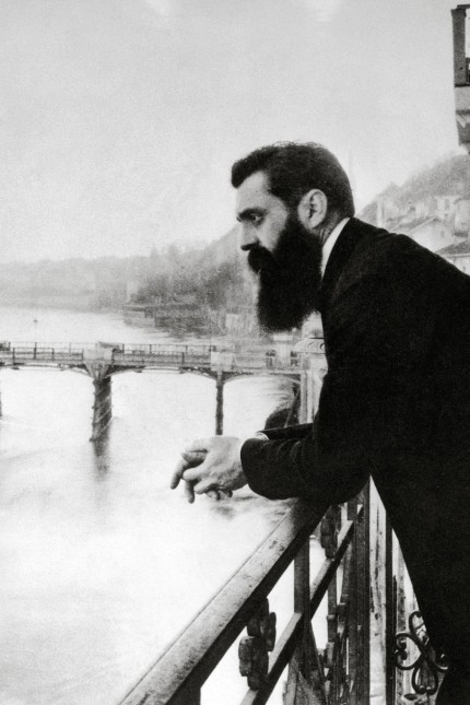 Theodor Herzl at the balcony of the hotel in Basel where he stayed during the zionistic congress overlooking the rhine river, Switzerland, Photograph, 1897