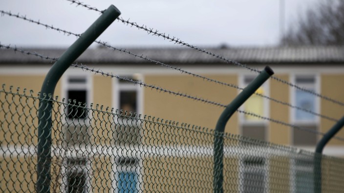 House of refugee deportation registry centre is pictured behind a fence in Manching