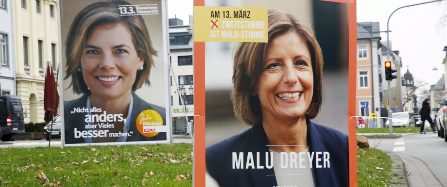 Election campaign posters of Dreyer and Kloeckner are seen in Koblenz