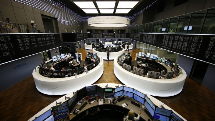 The German share prize index board and the trading room of Frankfurt's stock exchange are photographed during afternoon trading session in Frankfurt