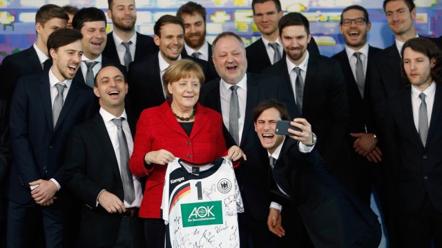 Federal Chancellor Angela Merkel Welcomes National Handball Team