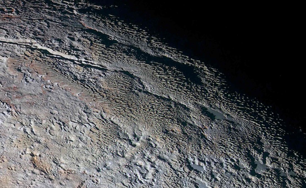The bladed terrain of Tartarus Dorsa on the dwarf planet Pluto is seen in an undated image from NASA's New Horizons spacecraft