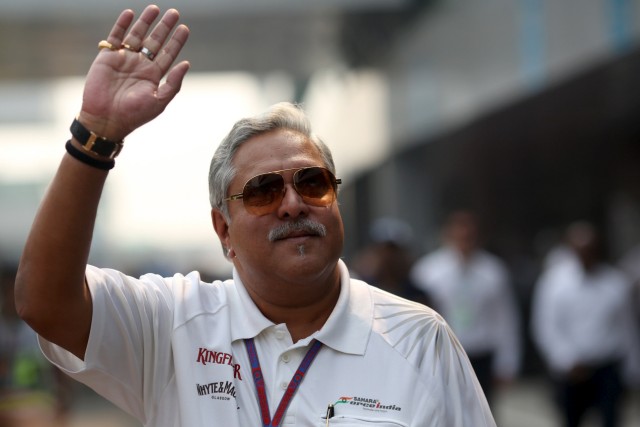 File photo of Force India team principal Vijay Mallya waving in the paddock during the third practice session of the Indian F1 Grand Prix at the Buddh International Circuit in Greater Noida
