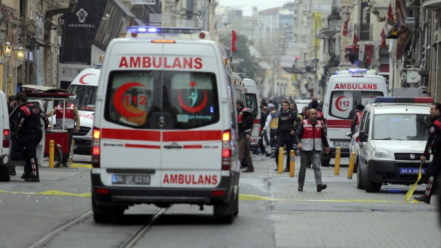 Police secure the area following a suicide bombing in central Istanbul