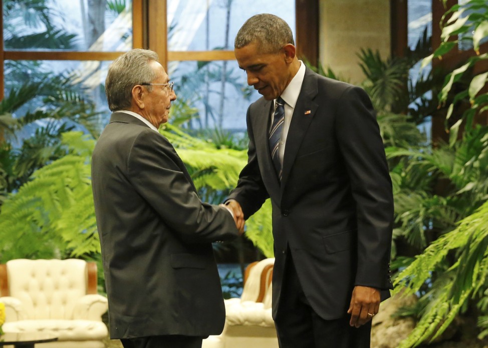U.S. President Barack Obama and Cuba's President Raul Castro shake hands in Havana