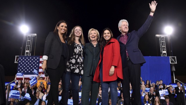 Eva Longoria, Chelsea Clinton, U.S. Democratic presidential candidate Hillary Clinton, America Ferrera and former President Bill Clinton wave to supporters before Hillary Clinton spoke at a campaign rally at the Clark County Government Center in Las