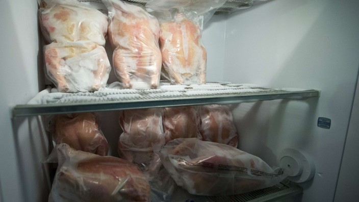Chickens are seen in one of two freezers at the Nice family farm in Kinston