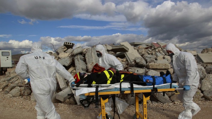 Emergency workers take part in exercises during an emergency response drill to simulate the aftermath of a dirty bomb explosion outside Madrid
