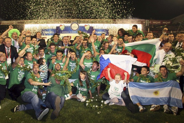 Bursaspor players and team members celebrate their championship victory in Bursa