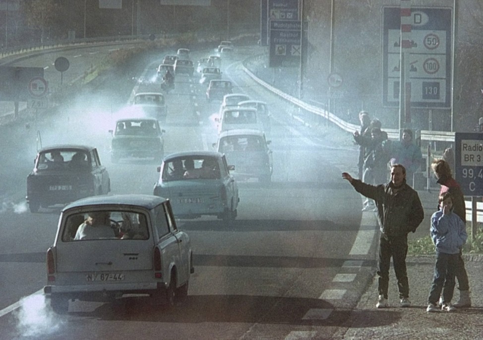 File picture shows East German Trabant cars make their way past East Germans who have crossed the former German border checkpoint Rudolphstein