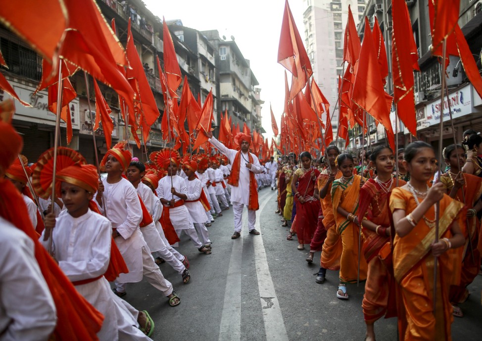 Maharashtrians dressed in traditional costumes attend celebrations to mark the Gudi Padwa festival in Mumbai