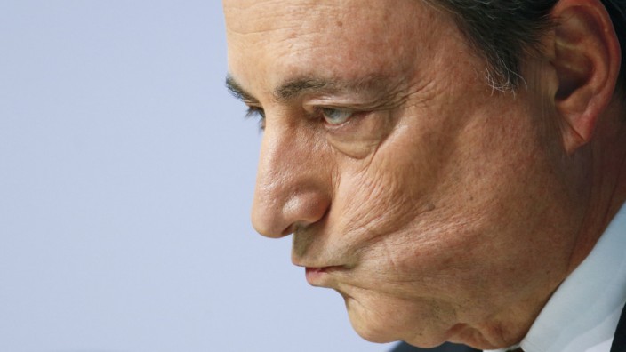 European Central Bank (ECB) President Draghi reacts during a news conference at the ECB headquarters in Frankfurt