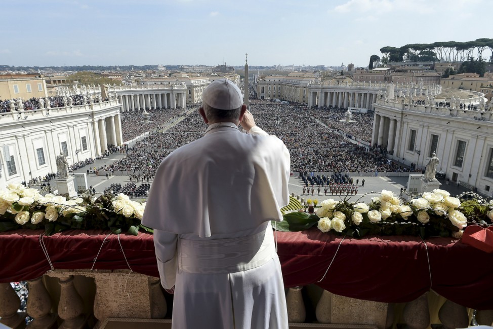 Pope Francis delivers the Urbi et Orbi benediction at the end of the Easter Mass in Saint Peter's Square at the Vatican