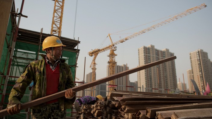 Umweltschutz: Wer so baut, verbaut allen die Zukunft: Bauarbeiter in Peking.
