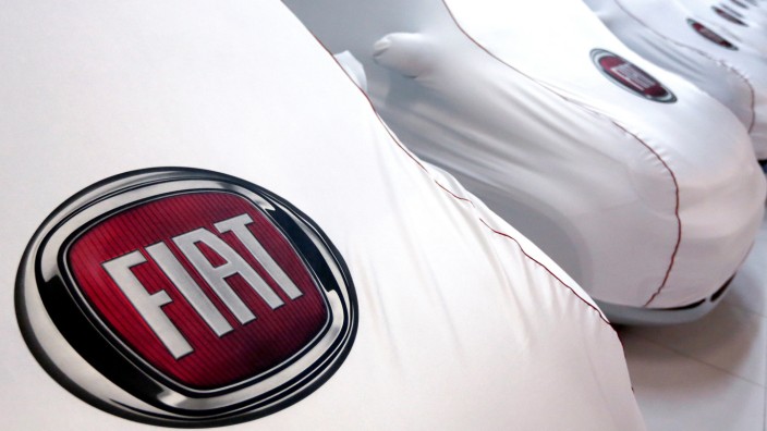 Fiat cars under covers are seen at a dealership in Rome