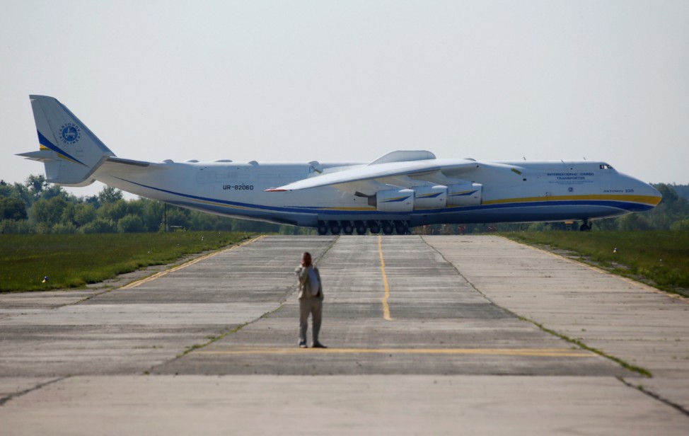 An Antonov An-225 Mriya, a cargo plane which is the world's biggest aircraft, is seen on an airfield before its first commercial flight to the Australian city of Perth, in the settlement of Hostomel outside Kiev