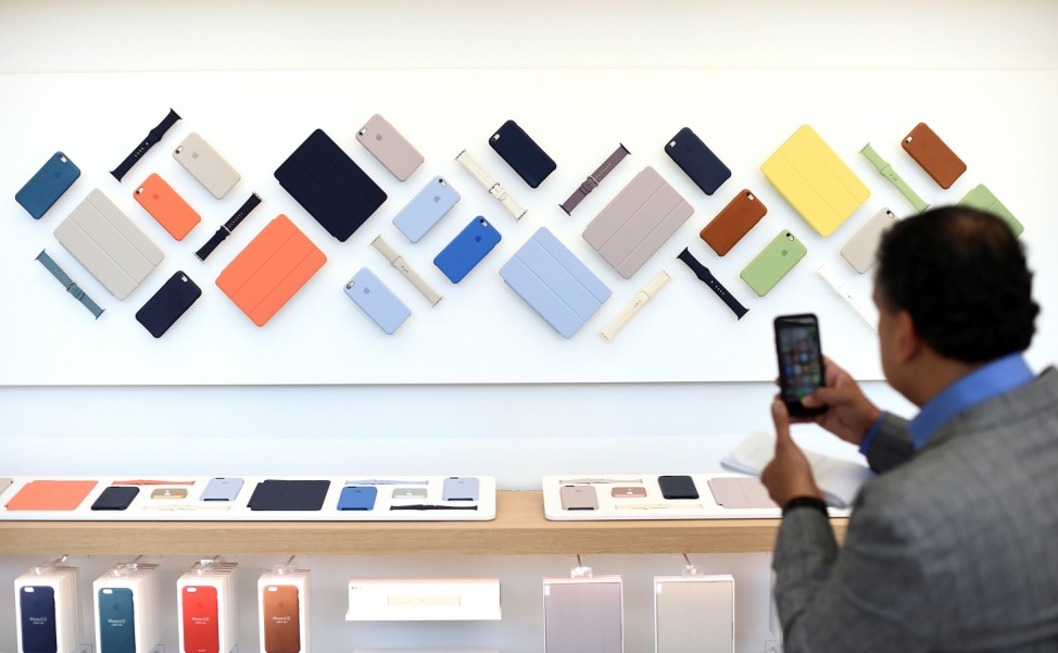 An arrangement of Apple products hangs at Apple's new retail location during a media preview in San Francisco