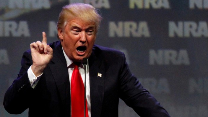Republican presidential candidate Donald Trump addresses members of the National Rifle Association during their NRA-ILA Leadership Forum during at their annual meeting in Louisville
