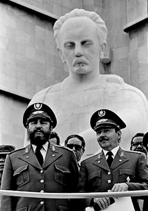 File photo of Fidel Castro and brother Raul during event in Havana