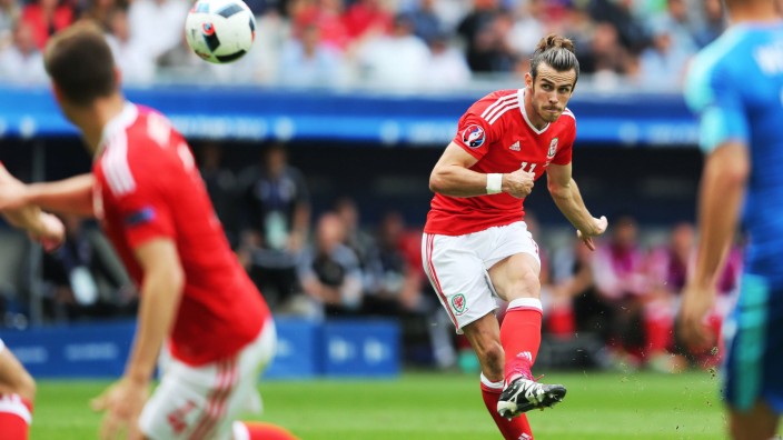 Gareth Bale of Wales scores the opening goal during the UEFA European Championships 2016 group B m