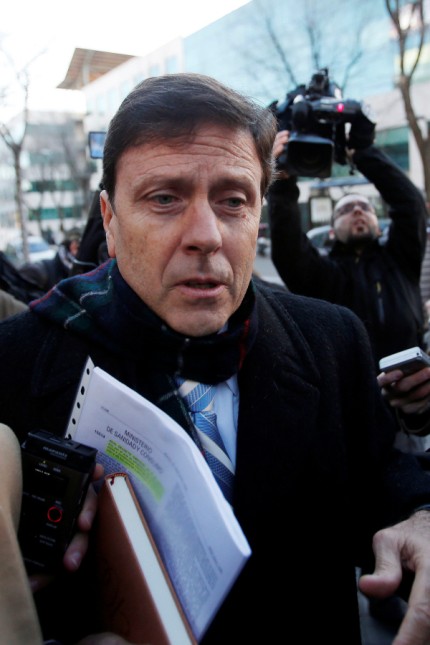 Spanish doctor Eufemiano Fuentes enters the courthouse on the first day of the Operacion Puerto trial in Madrid, Spain