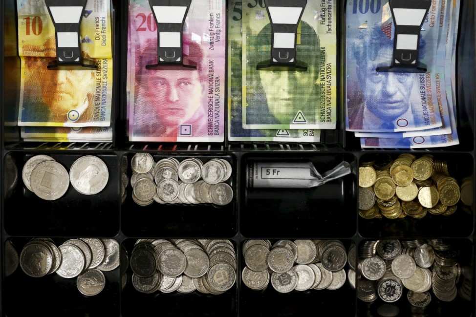 File photo illustration of Swiss franc currency in a cash drawer in Bern