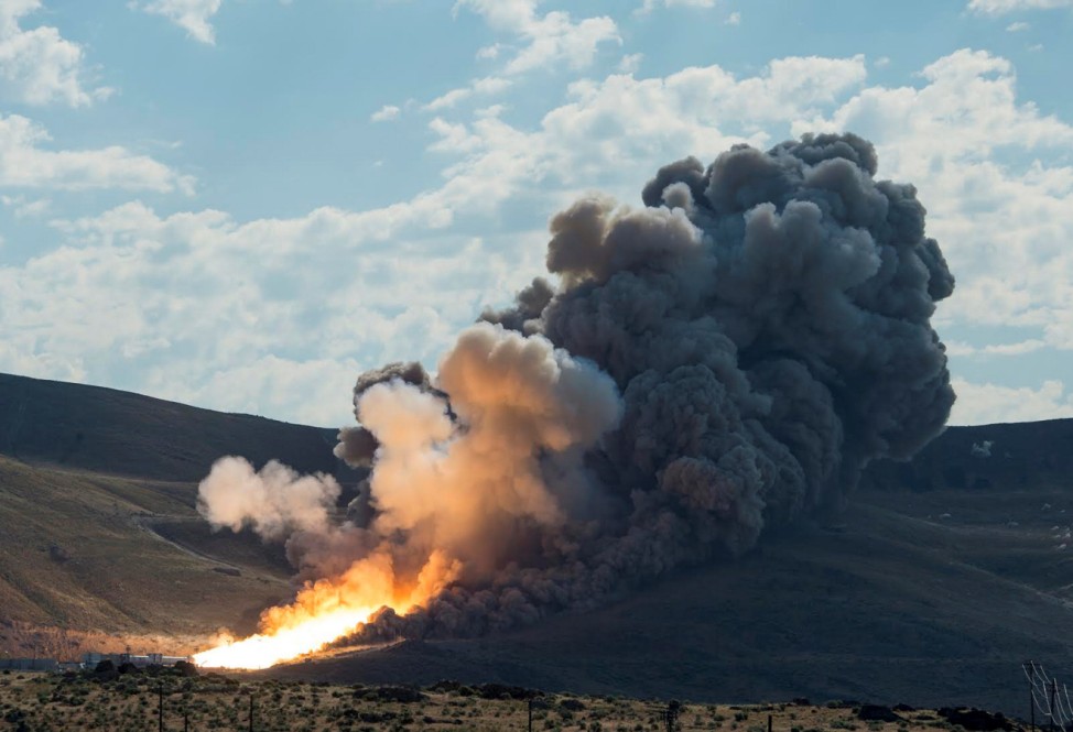 Handout photo of the SLS Five-Segment Solid Rocket Motor, undergoing a static test fire at the Orbital ATK facility in Promontory, Utah, U.S.