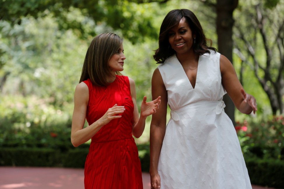 U.S. first lady Michelle Obama walks with Spain's Queen Letizia at the Zarzuela palace near Madrid