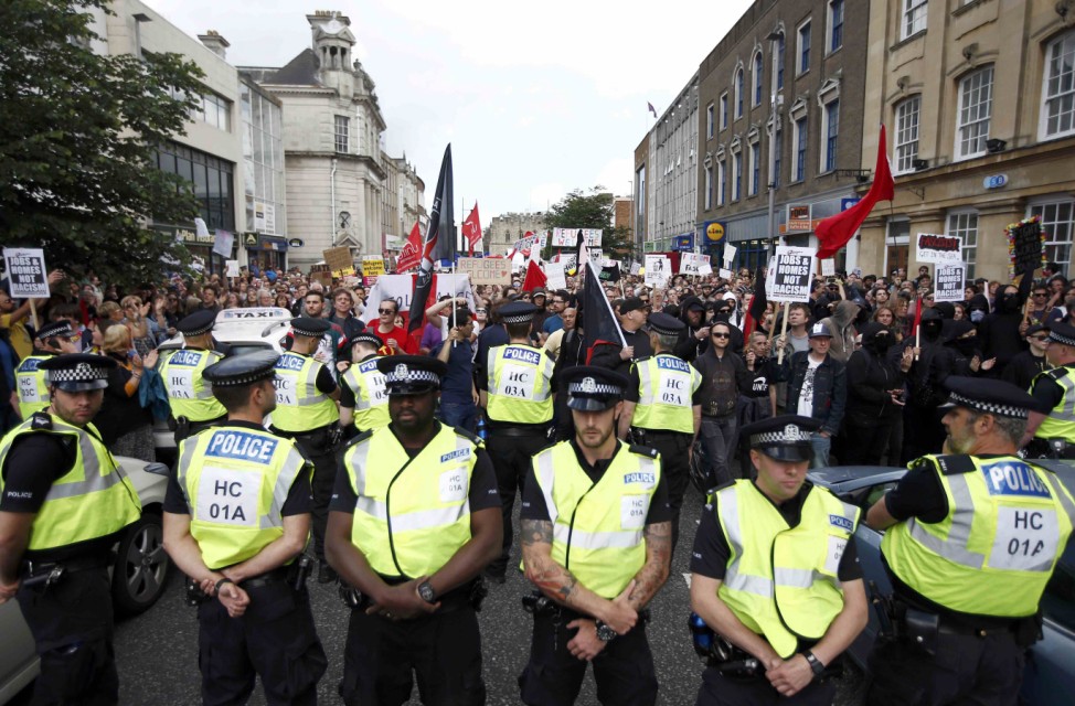 Police officers line up in front of a demonstration against Britain's decision to leave the European Union, in Southampton