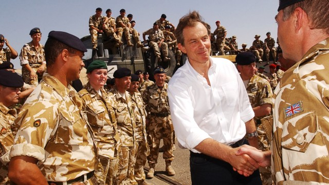 File photo of British Prime Minister Tony Blair meeting troops in Iraq